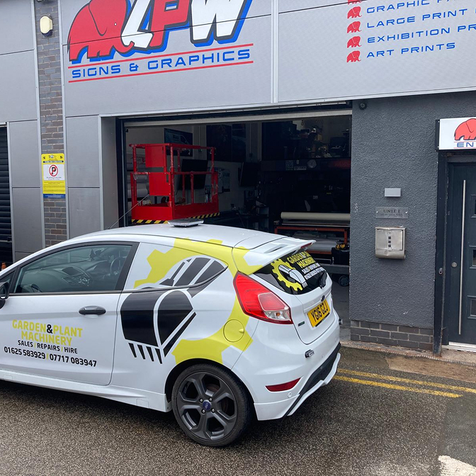 Car parked outside signage business